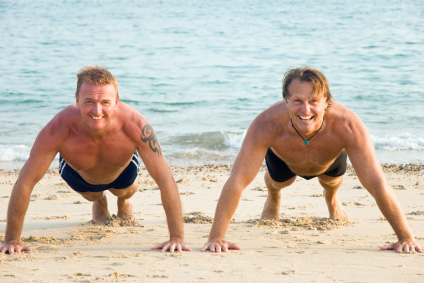 a beach workout with a buddy can be real competitive