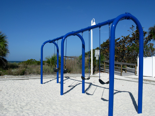 swings for children at sunset pavilion at middle jetty on sunset beach