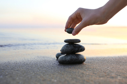 Stacking rocks on the Florida beach is a way of communicating spiritually.