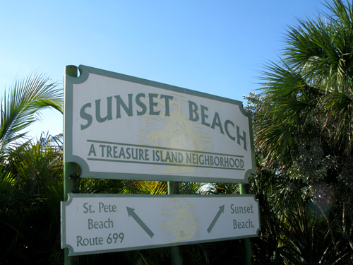 sunset beach direction sign on gulf blvd