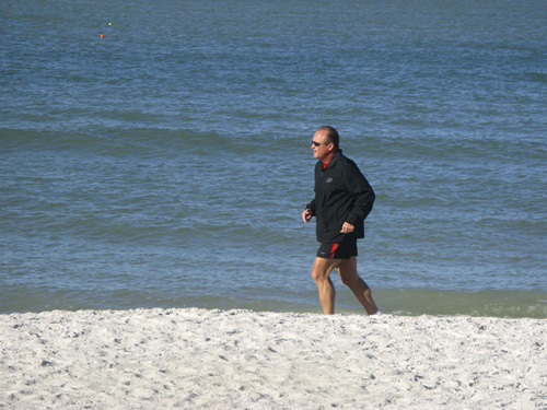 Another runner on Thanksgiving Day at Treasure Island Beach.