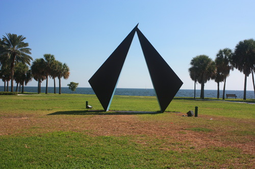 vinoy park has a huge art structure in the small grassy area