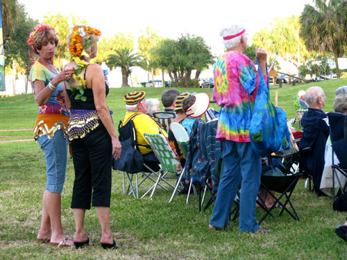 american stage in the park, st petersburg fl, old friends catch up on the latest fashions