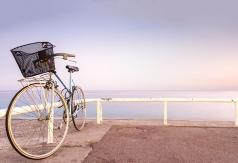 A bike ride along the beach is the perfect way to start the morning.