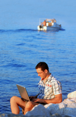 become a travel writer and make good money with your laptop