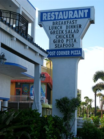 the sign for breakfast at post corner restaurant