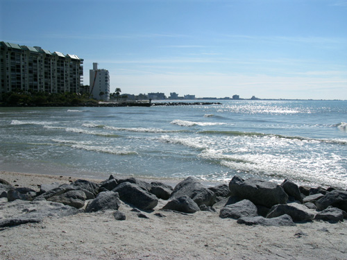 sunset beach direction sign on gulf blvd