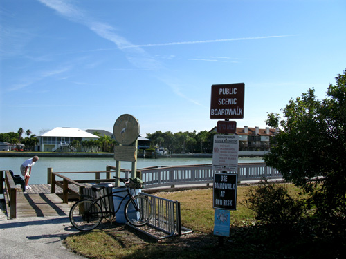 sunset beach boardwalk heron parking lot