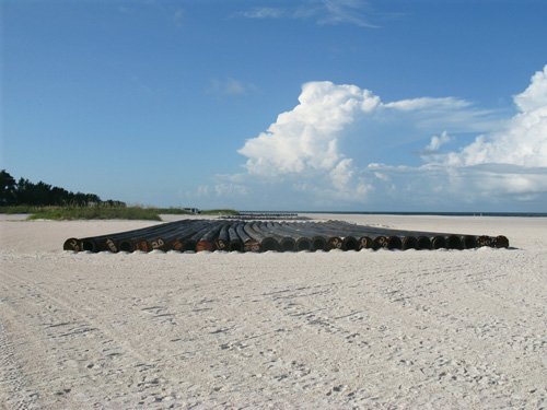 treasure island beach renourishment project pipes stacked at gulf view park beach