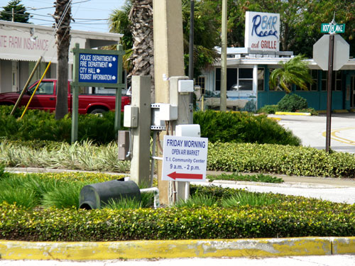 the treasure island open air market sign